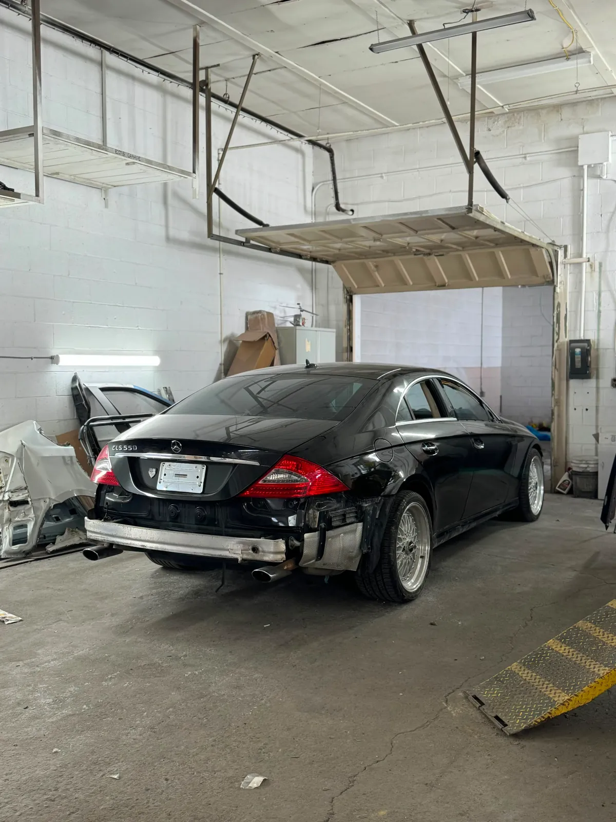 Vehicle receiving body repair work in the shop