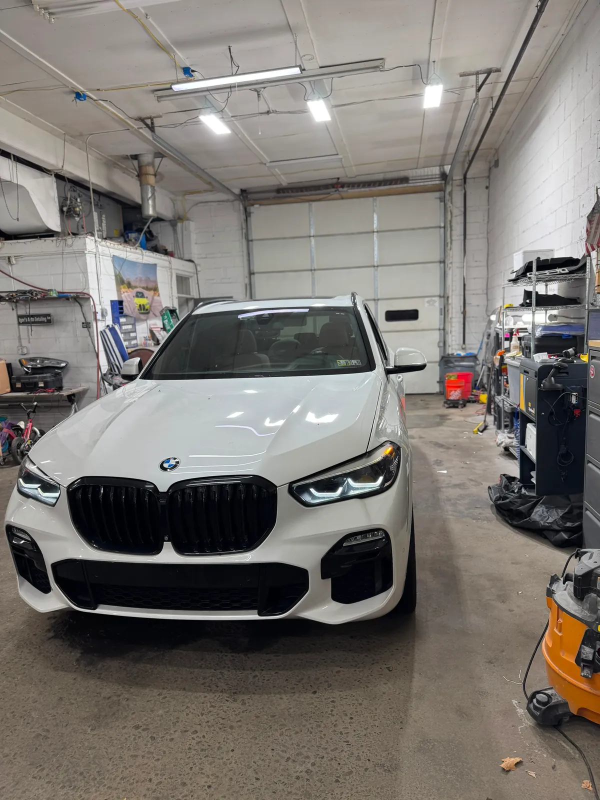 BMW SUV inside Igor’s Auto Repair workshop