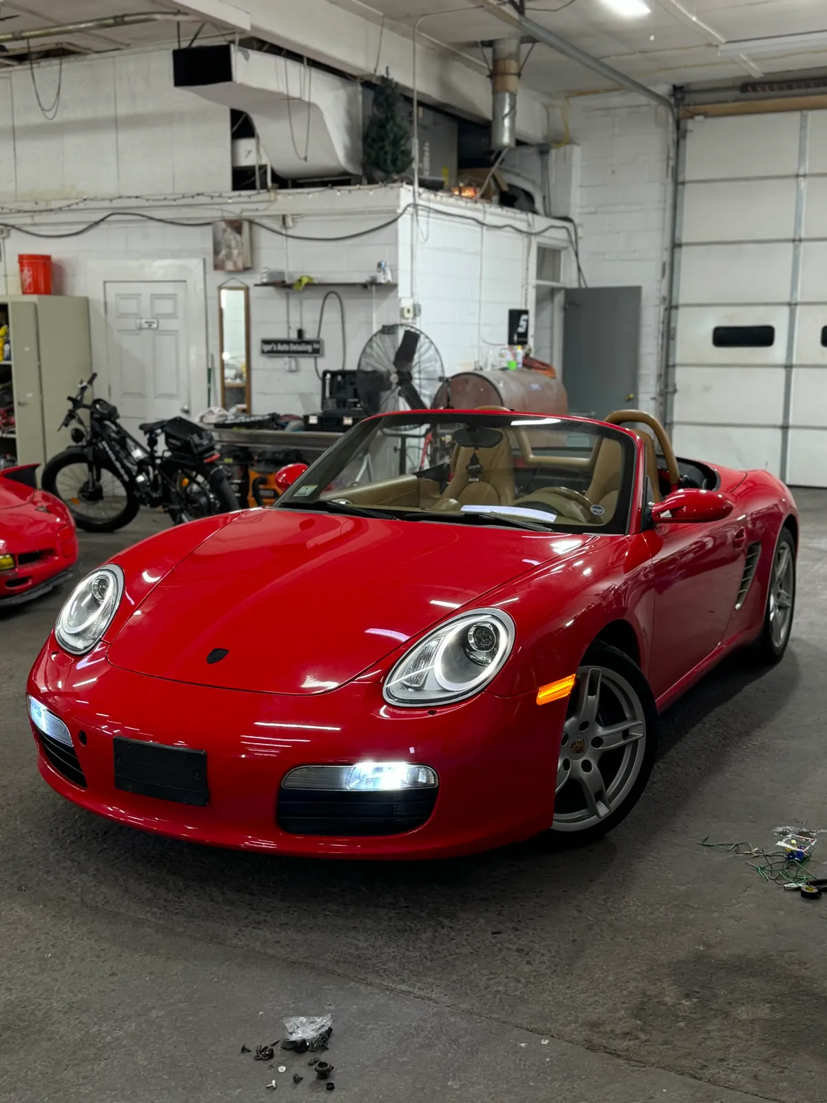 Detailed red sports car inside the Hatboro shop